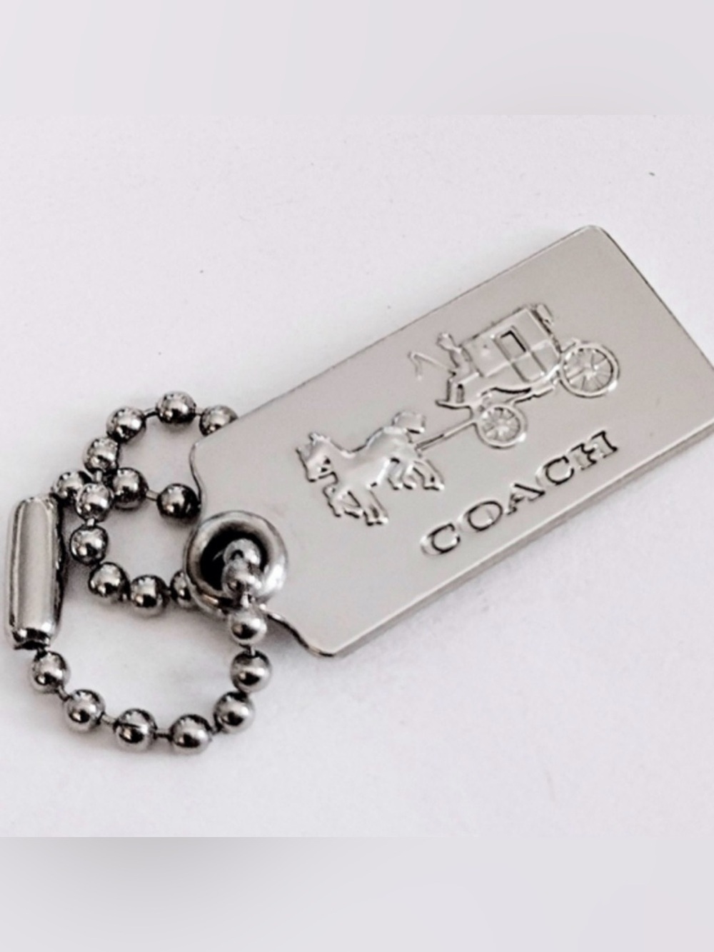 Coach Silver Tone Embossed Horse & Carriage bag Tag or Keychain